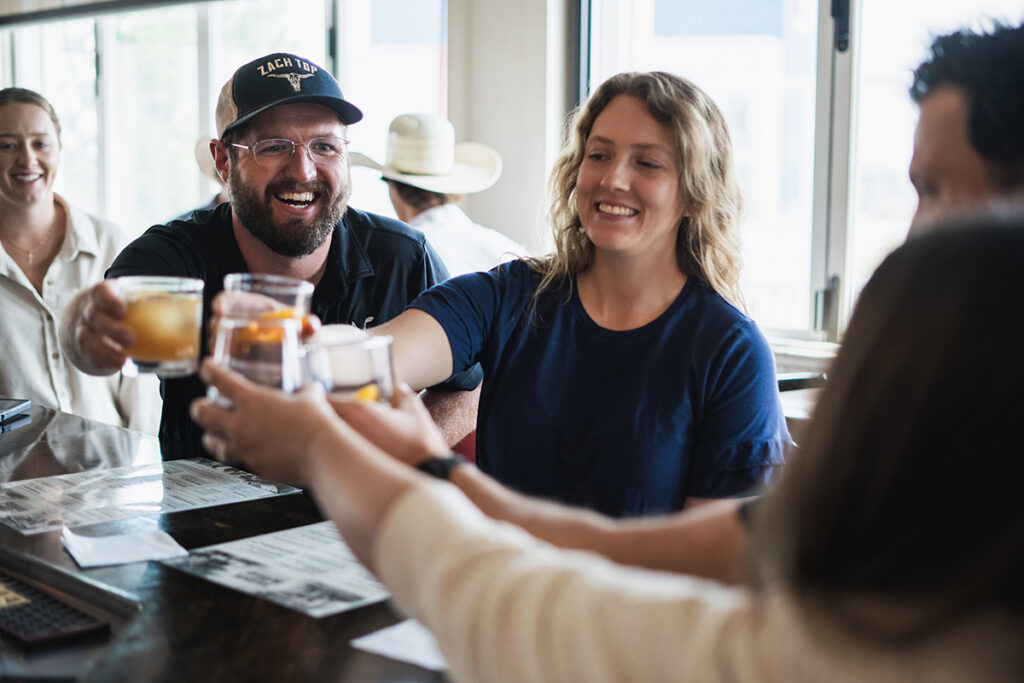 Guests in the Sunroom at Bourbon Brothers Colorado Springs